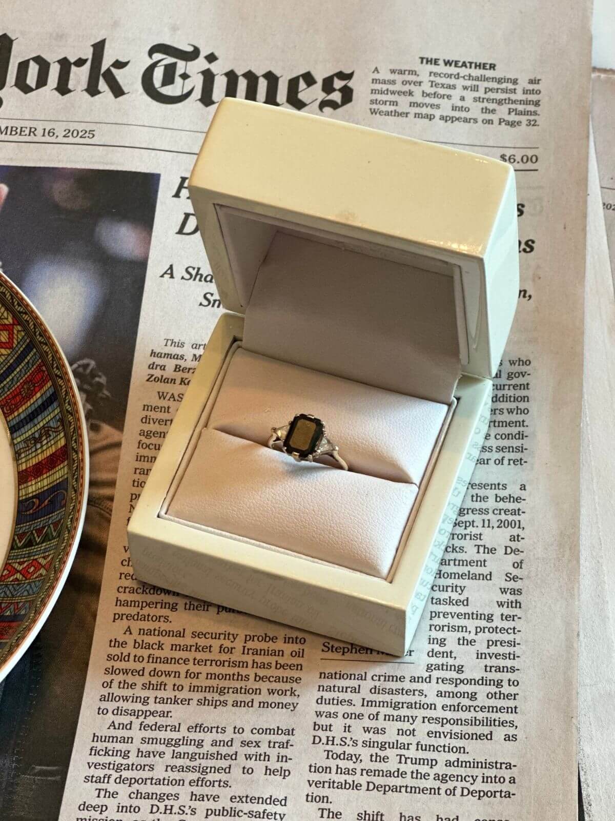 Anna Sheffield Ring in box on newspaper