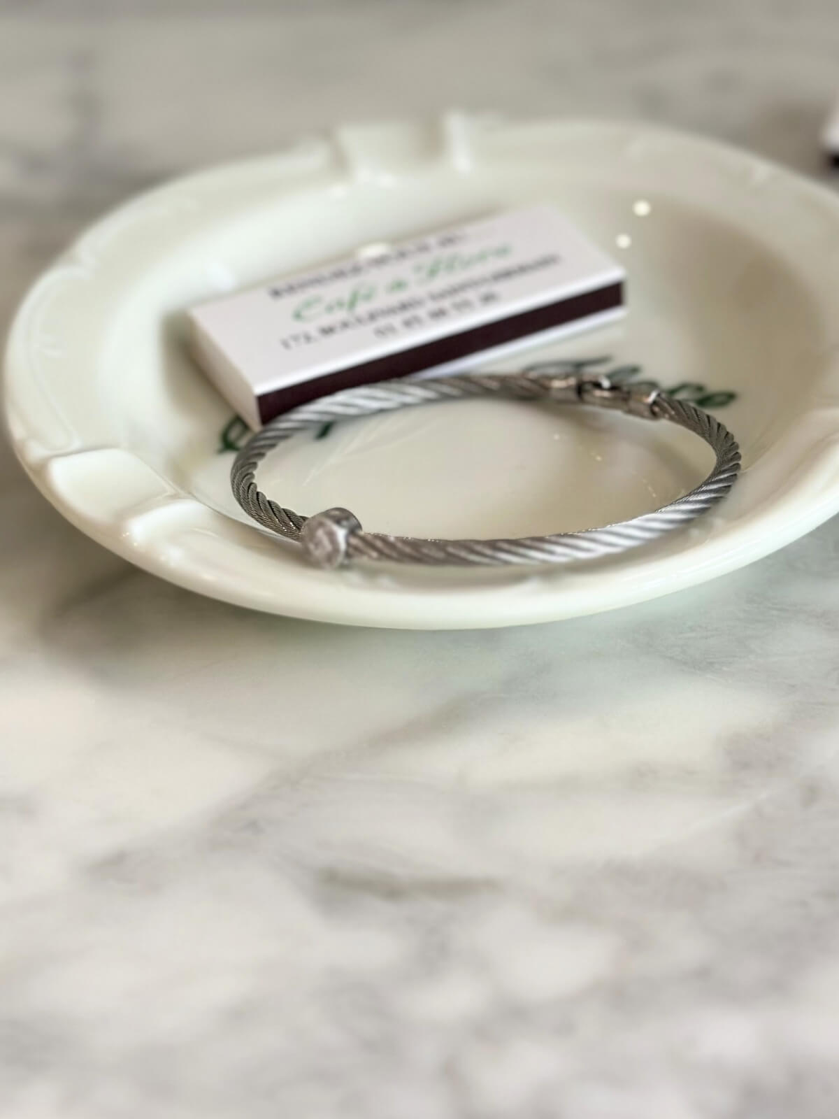 Louise Row Studio featuring Charriol Silver Bracelet with diamond station on plate