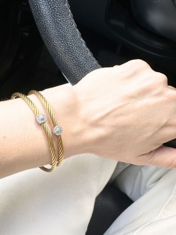 Louise Row Studio featuring two Charriol bracelet on arm