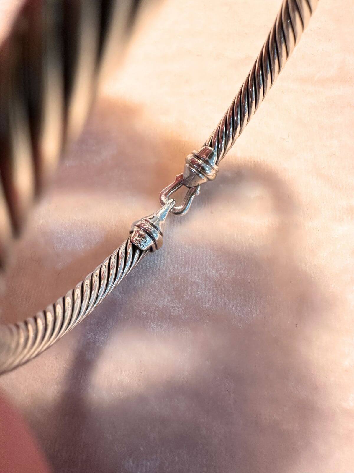 David Yurman buckle bracelet on display showing signature