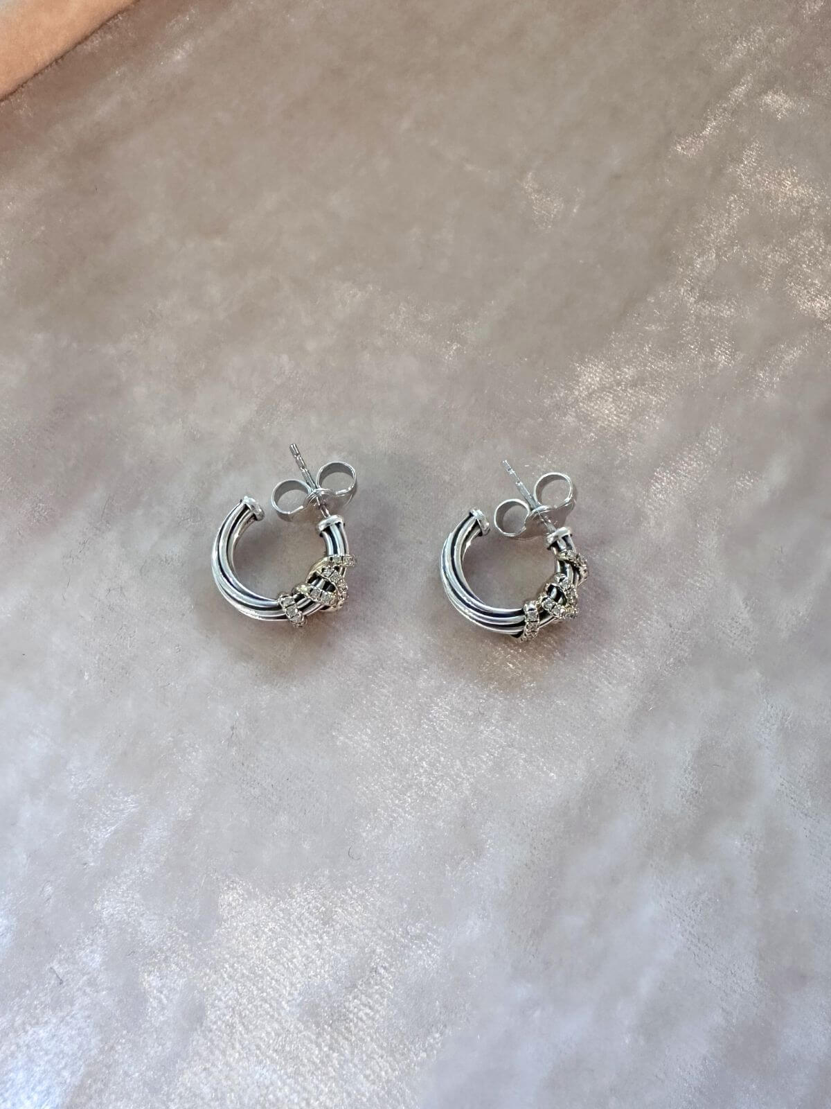 David Yurman Helena silver and gold small hoops on pink display