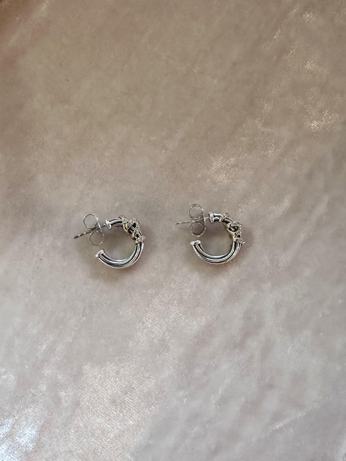 David Yurman Helena silver and gold small hoops on pink display