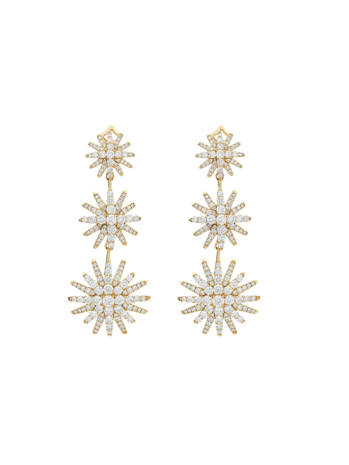 Pair of gold and diamond star-shaped earrings on a white background