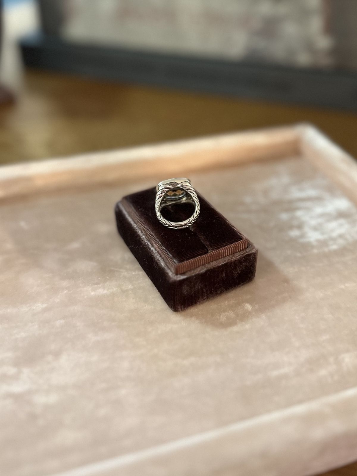 David yurman Albion ring in brown box on pink fixture back