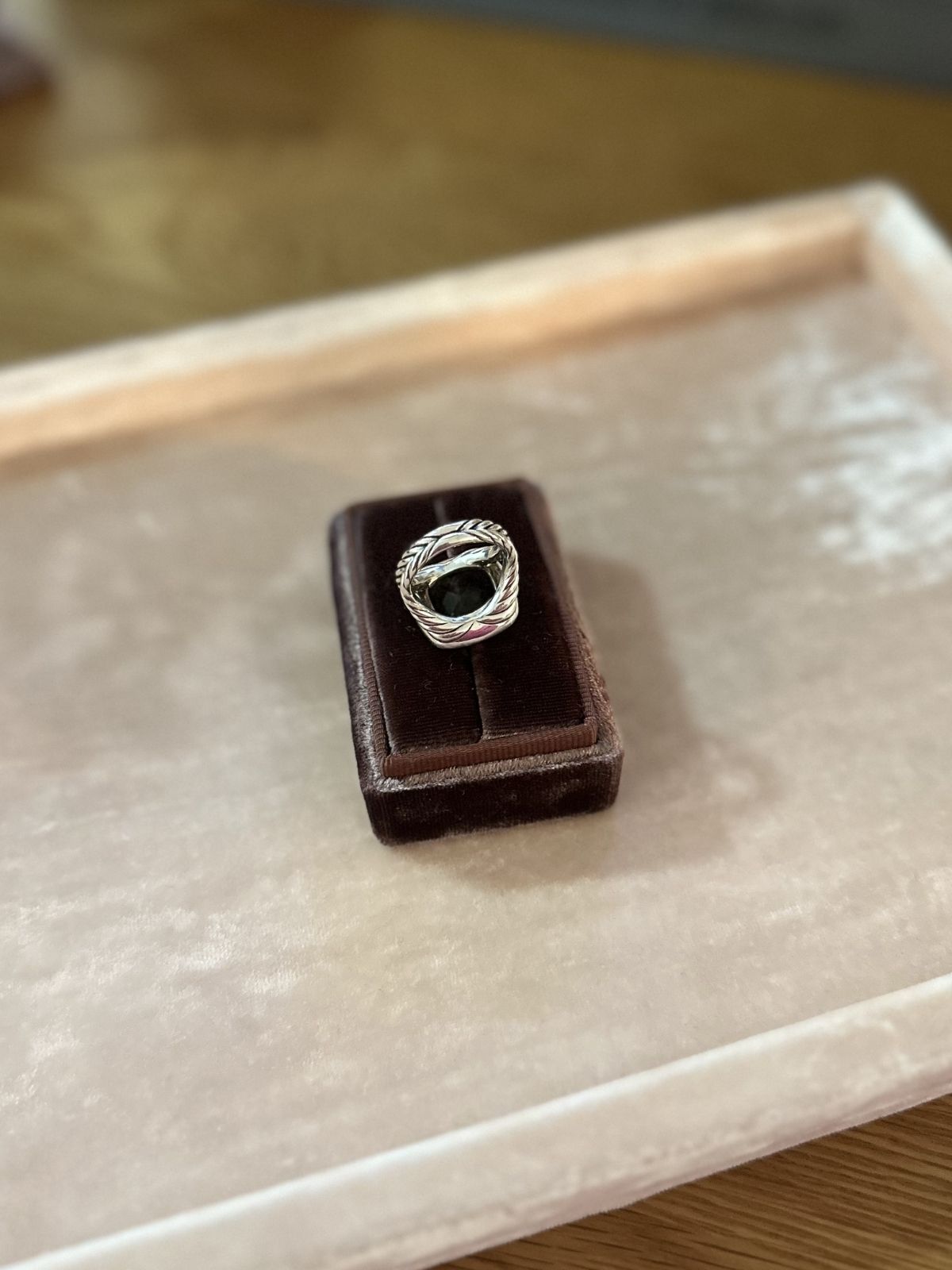 David yurman Albion ring in brown box on pink fixture back