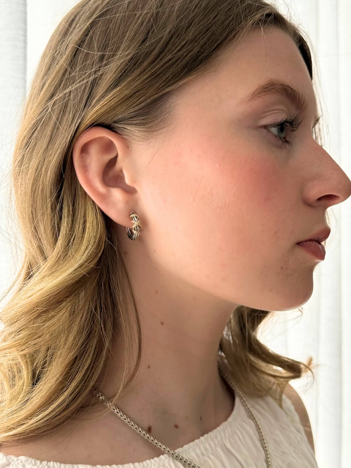 Louise Row Studio featuring David yurman Helena 2 tone small hoop earrings on close-up of model