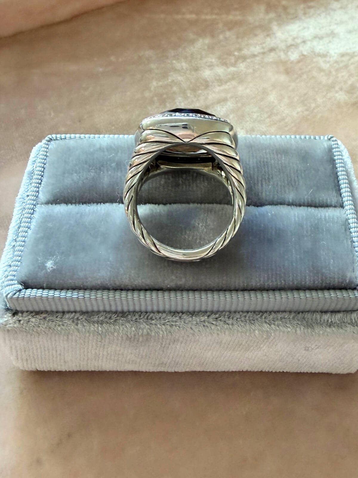 Louise Row featuring David Yurman Albion ring, smokey quartz center stone with gold and silver metal on grey fixture.