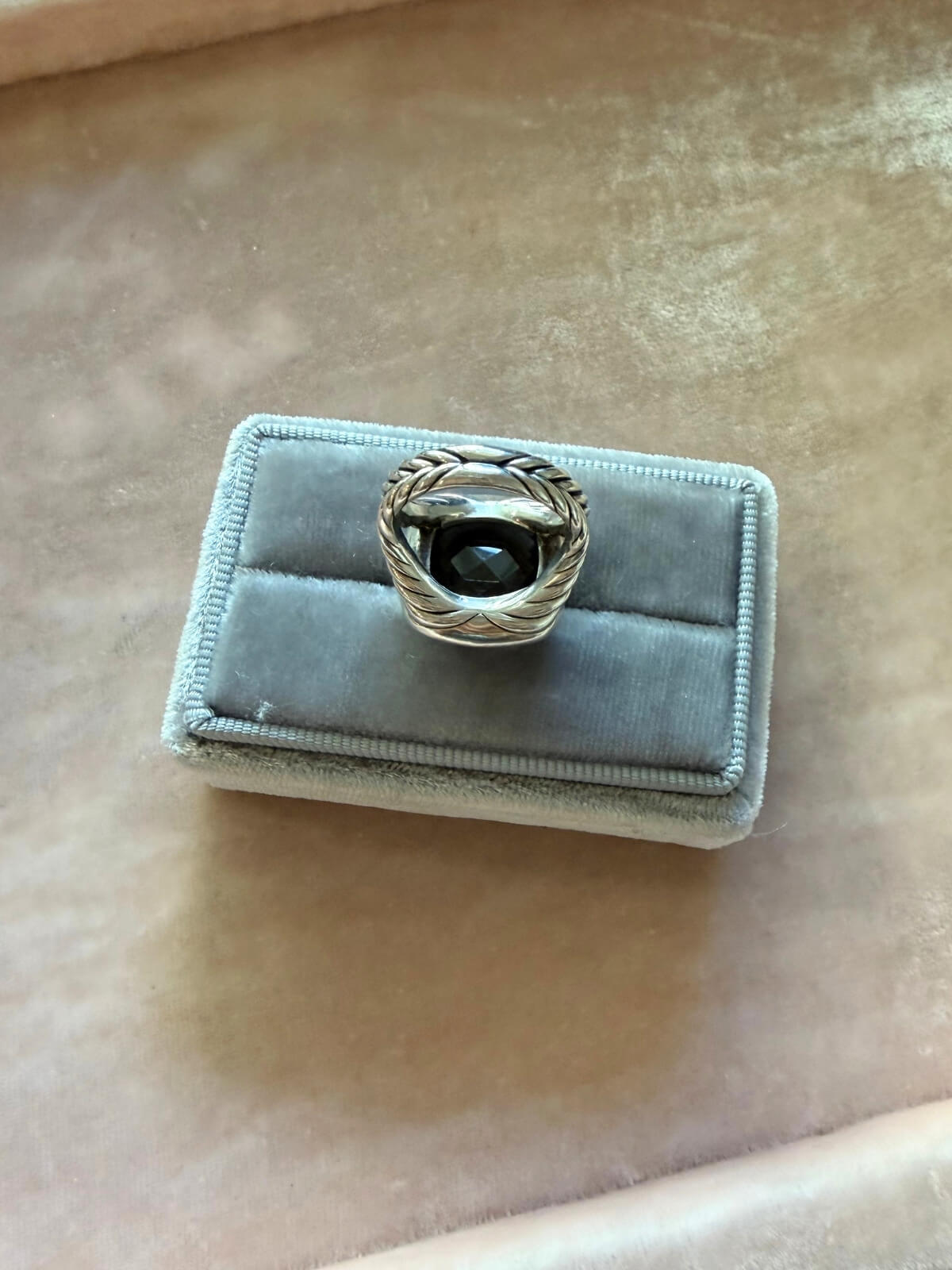 Louise Row Studio featuring David Yurman Albion ring, smokey quartz center stone with gold and silver metal on grey fixture.