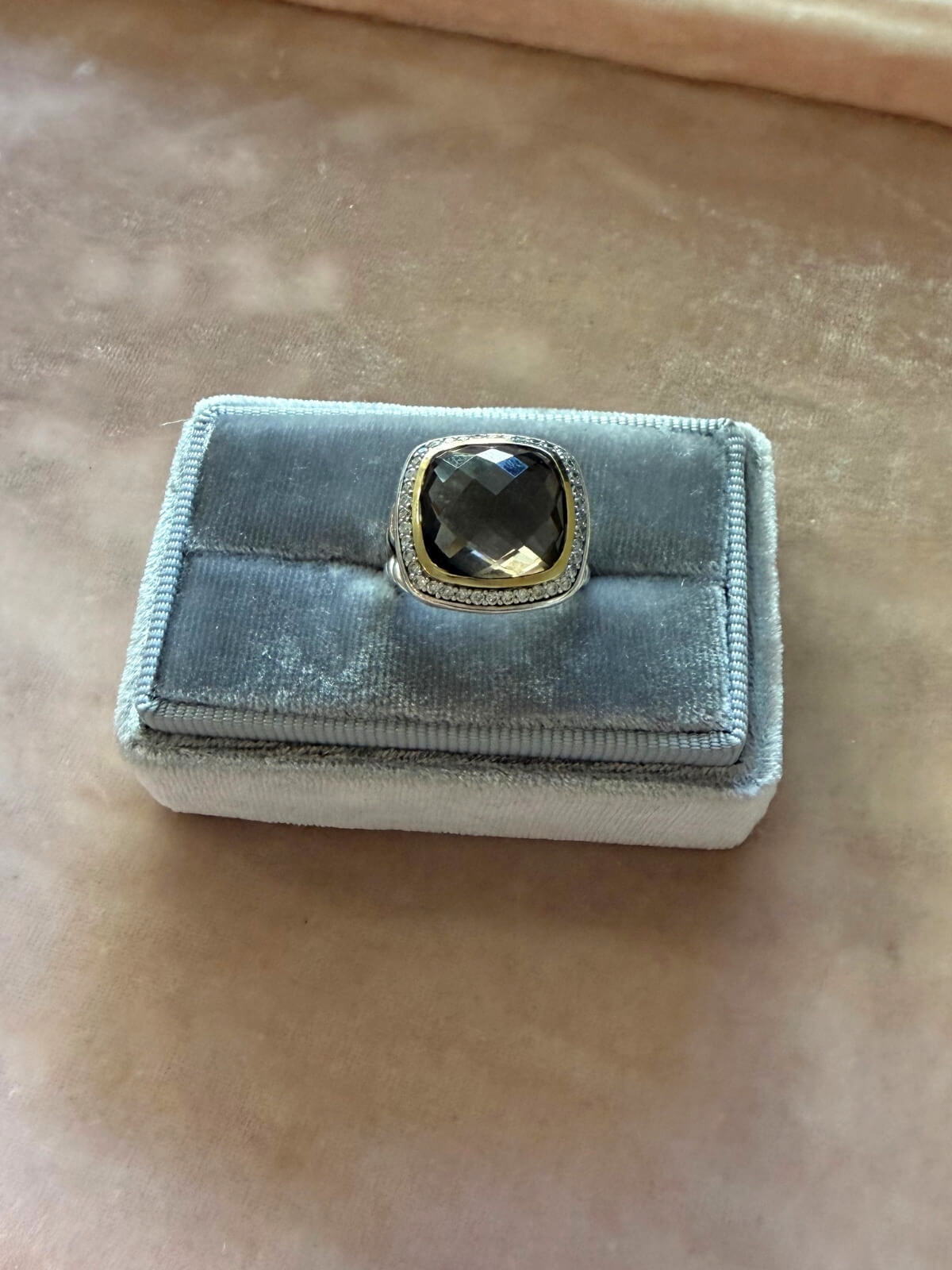 Louise Row Studio featuring David Yurman Albion ring, smokey quartz center stone with gold and silver metal on grey fixture.