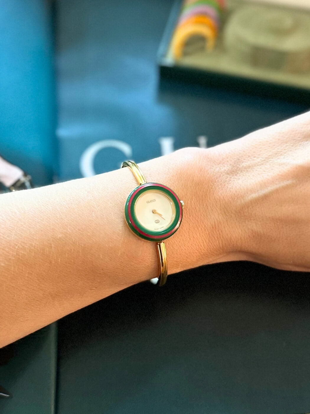 Louise Row featuring vintage Gucci 1100 watch on wrist