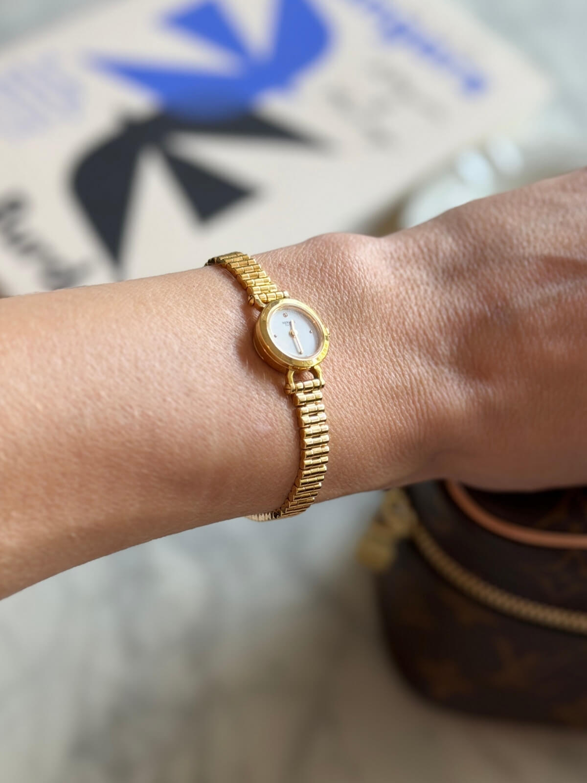 Louise Row featuring Hermes Faubourg watch on wrist