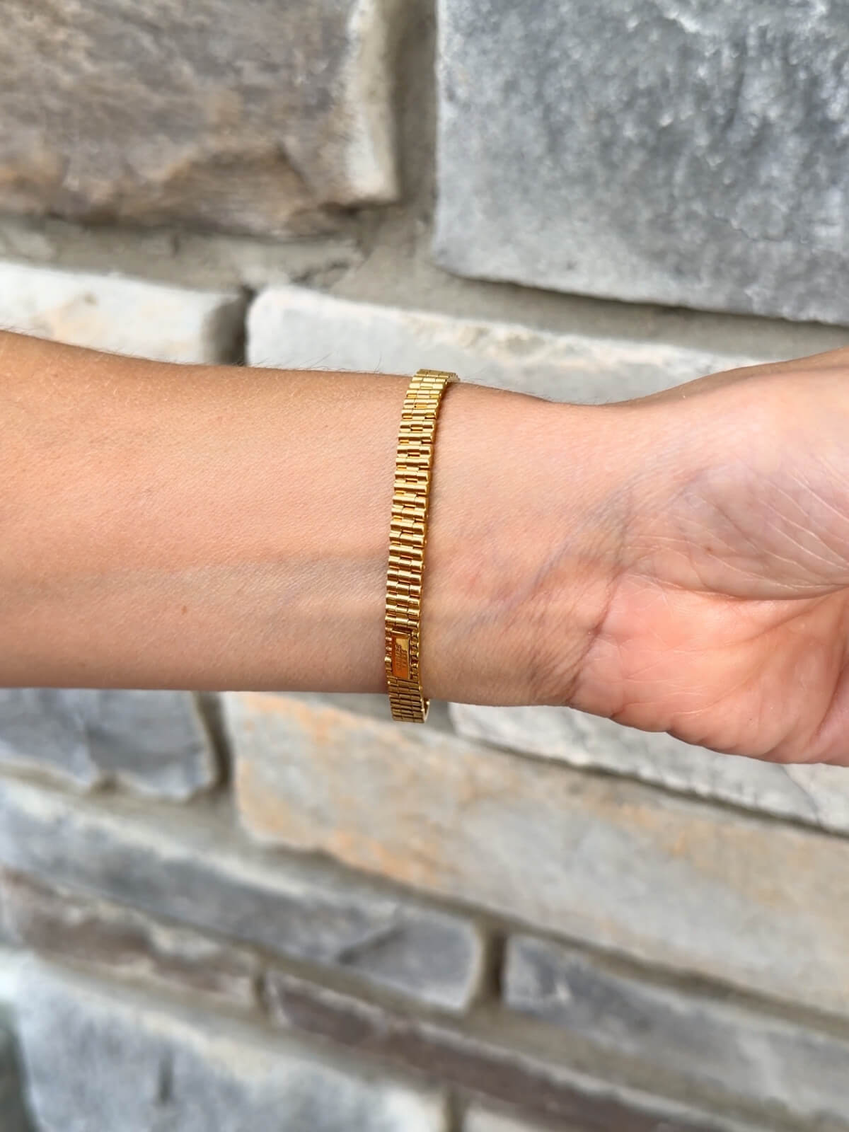 Louise Row featuring Hermes Faubourg watch on wrist
