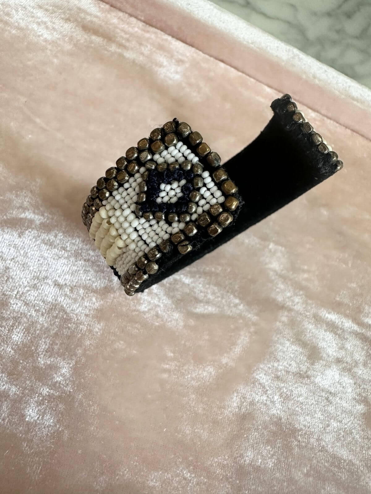 Louise Row Studio featuring Isabel Marant beaded cuff on pink tray