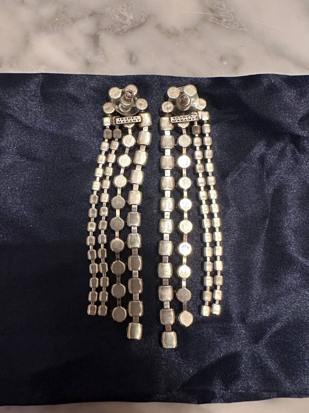 Isabel Marant Earring back side on silk pouch