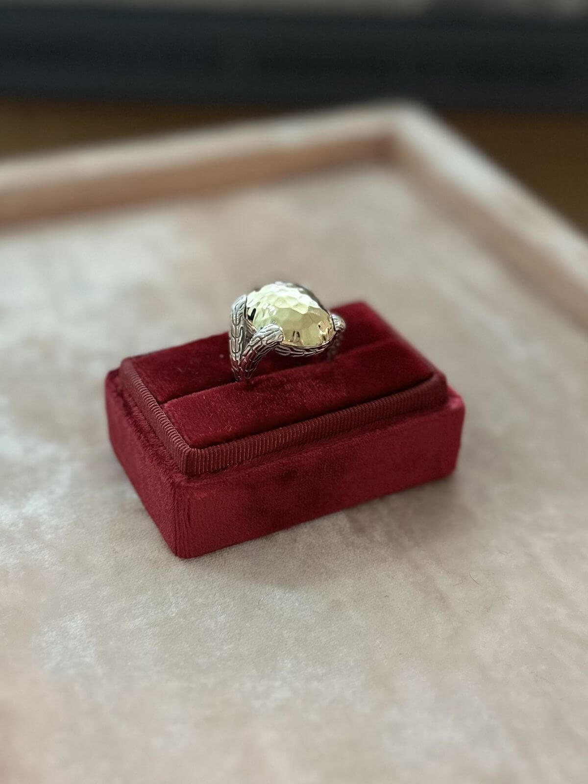 John Hardy ring silver and gold on red fixture