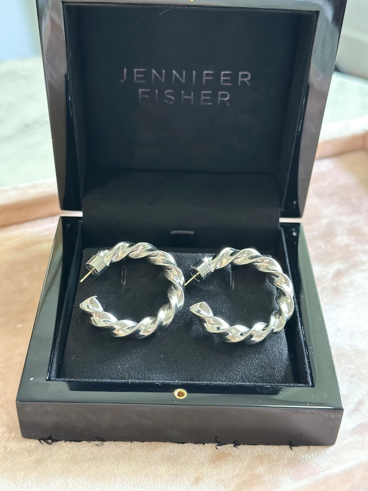 Louise Row featuring Jennifer Fisher Silver Lily Hoop in box
