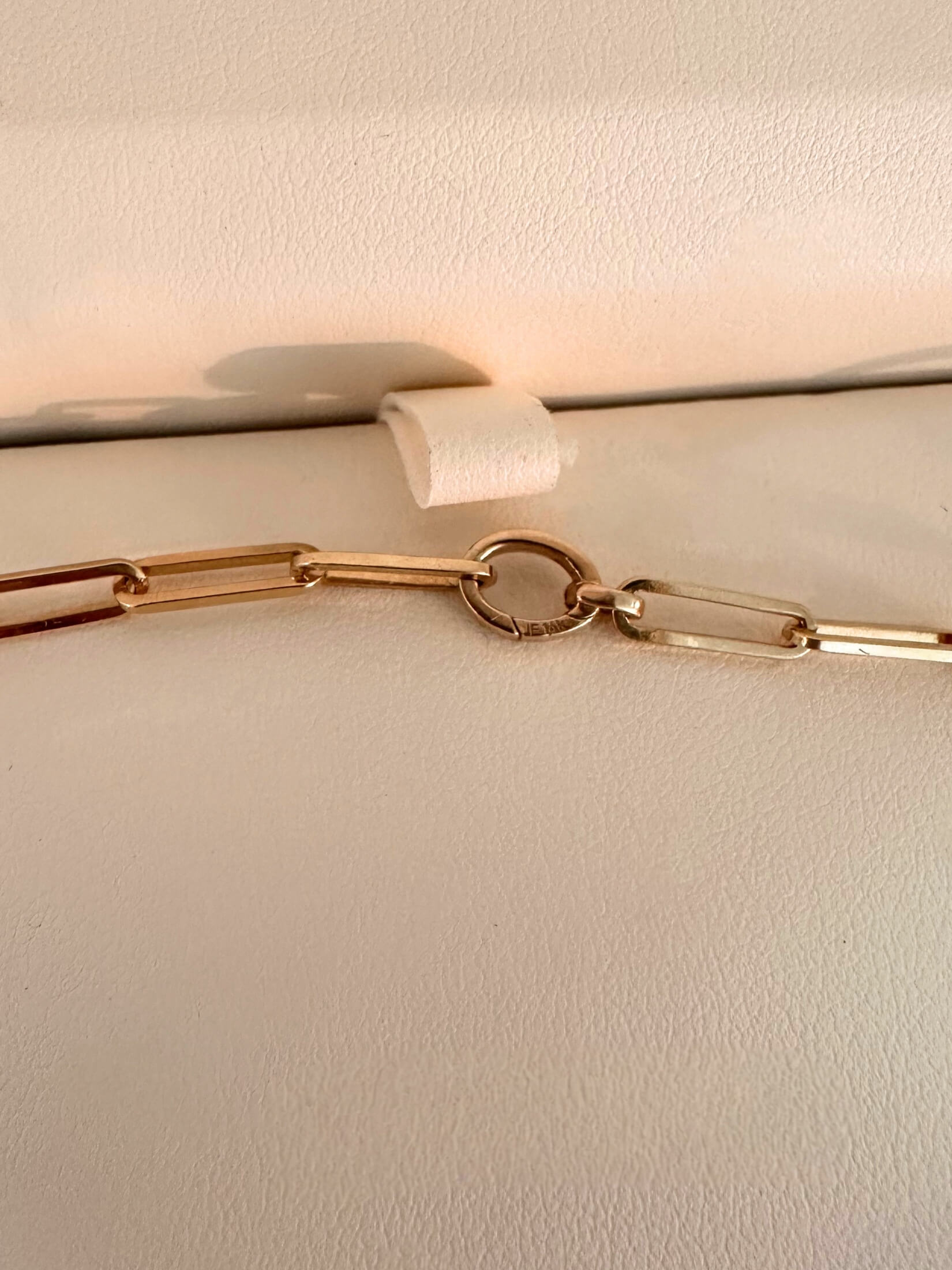 Louise Row featuring Jennifer Fisher gold paperclip necklace in box on table showing detail