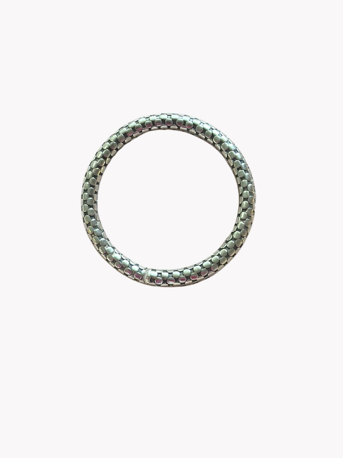 Louise Row Studio featuring John Hardy silver Dot single coil bracelet on white background.