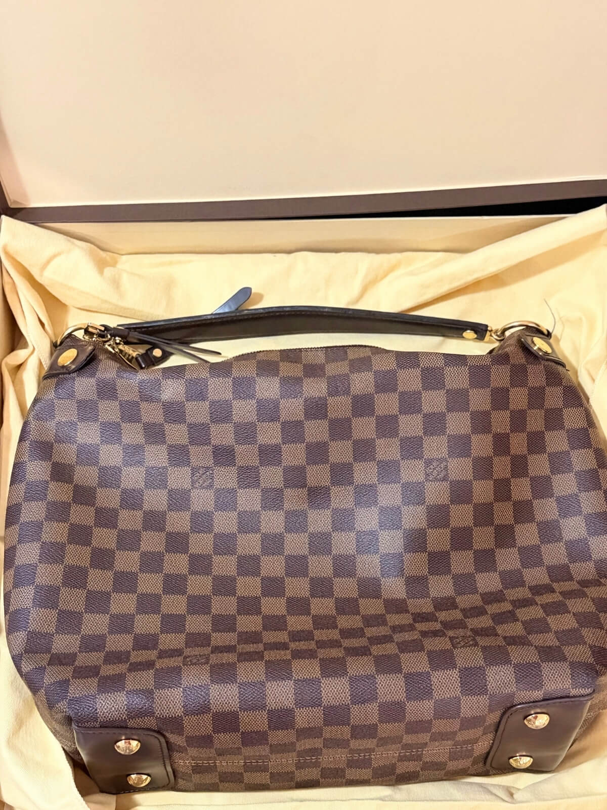 Louise Row featuring Louise Vuitton Damier Ebene bag in box or on mannequin