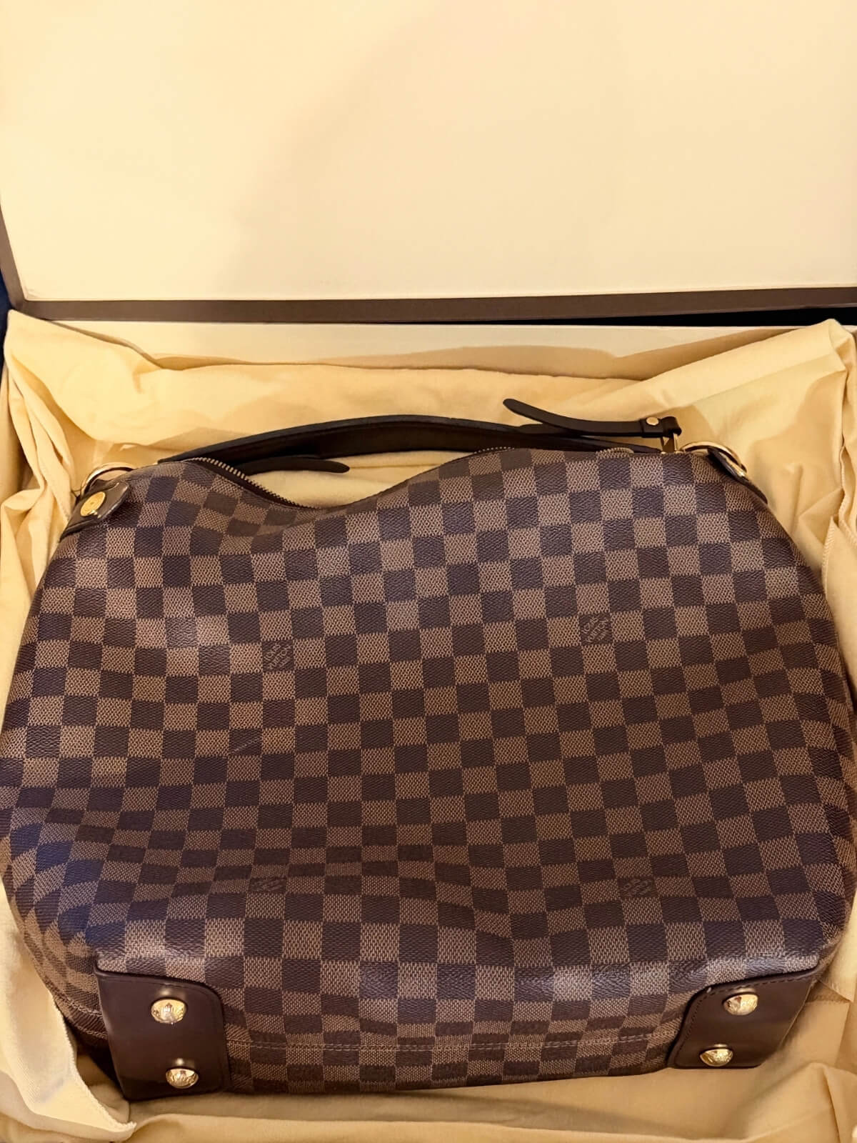 Louise Row featuring Louise Vuitton Damier Ebene bag in box or on mannequin