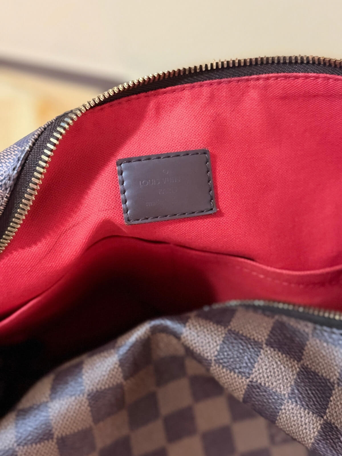 Louise Row featuring Louise Vuitton Damier Ebene bag in box or on mannequin