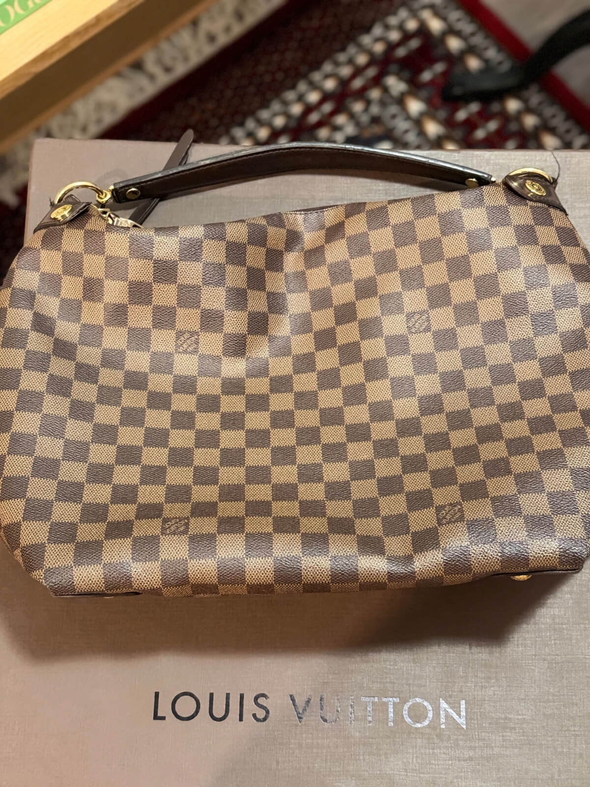 Louise Row featuring Louise Vuitton Damier Ebene bag in box or on mannequin