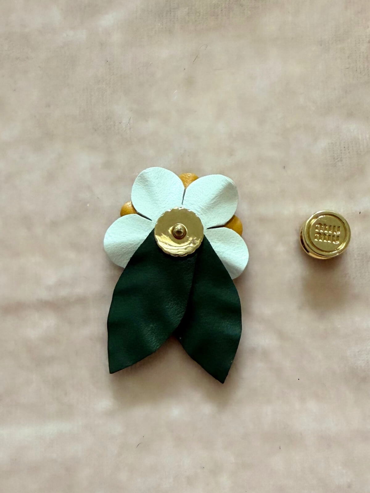 Louise Row featuring Miu Miu leather flower pin Back