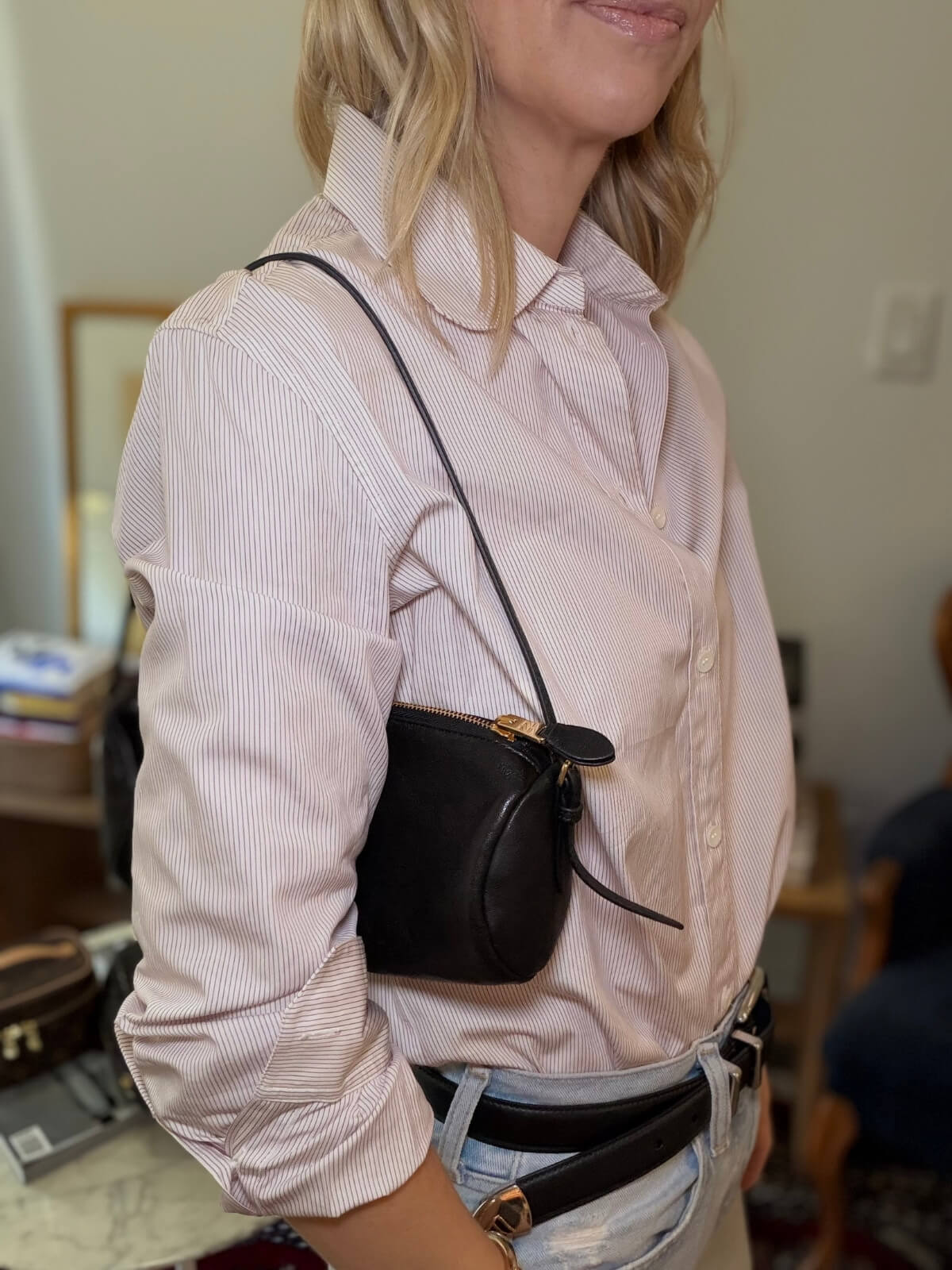 Louise Row featuring model with Miu Miu bag on shoulder