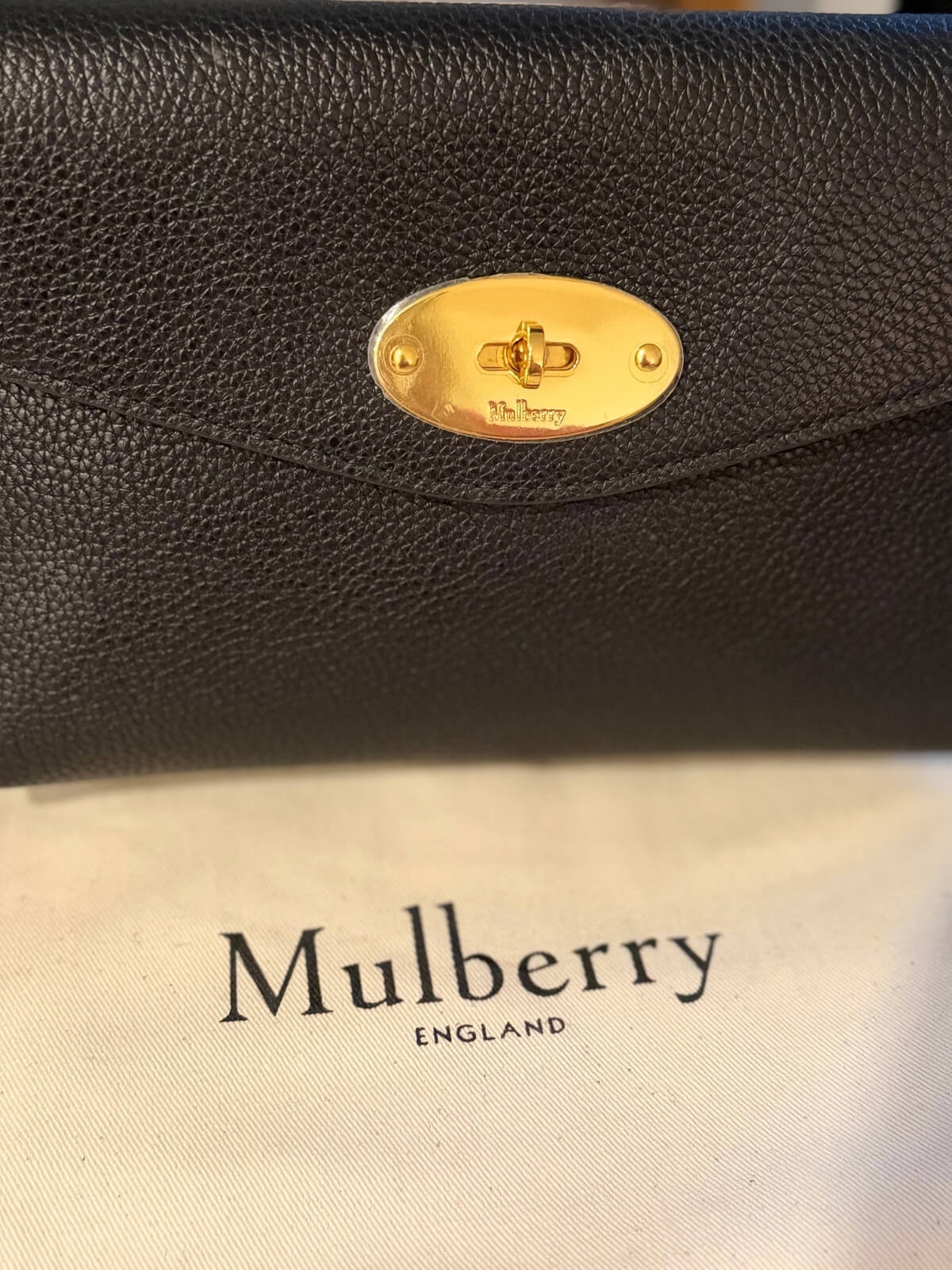 Louise Row featuring Mulberry Cosmetic Bag in black on table