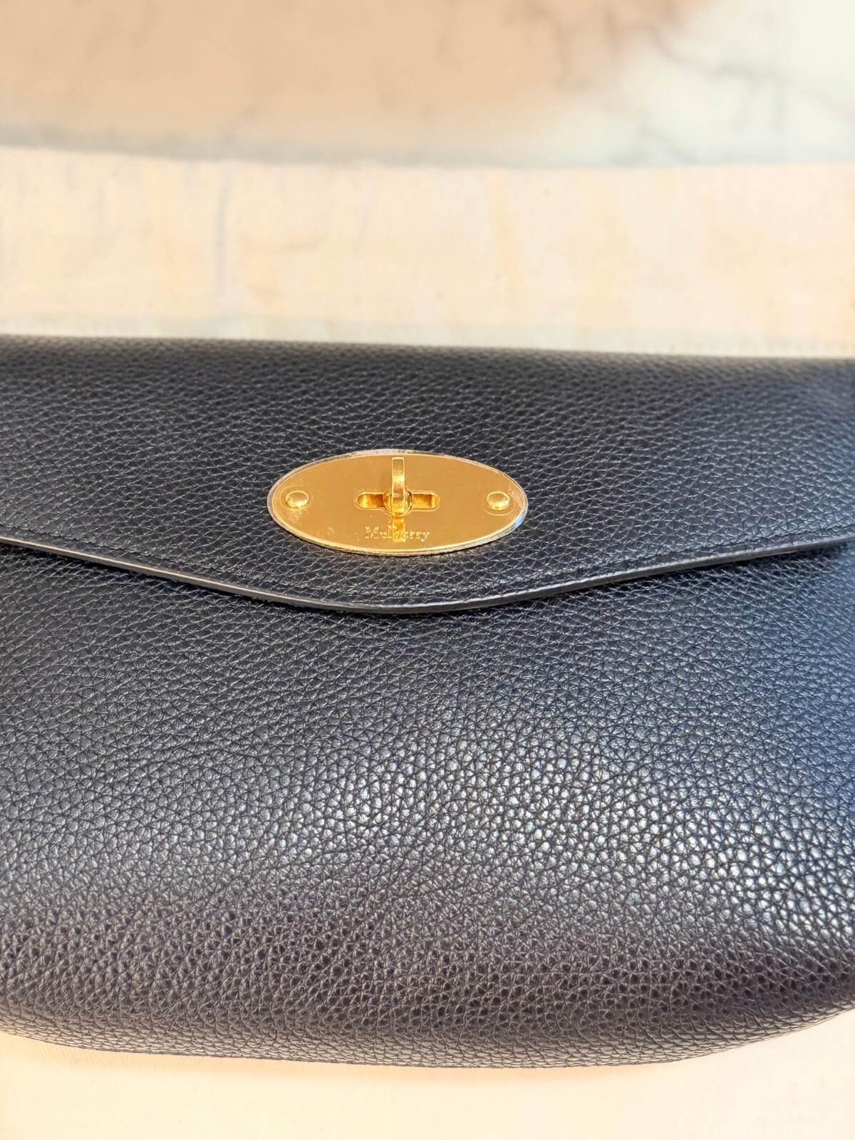 Louise Row featuring Mulberry Cosmetic Bag in black on table