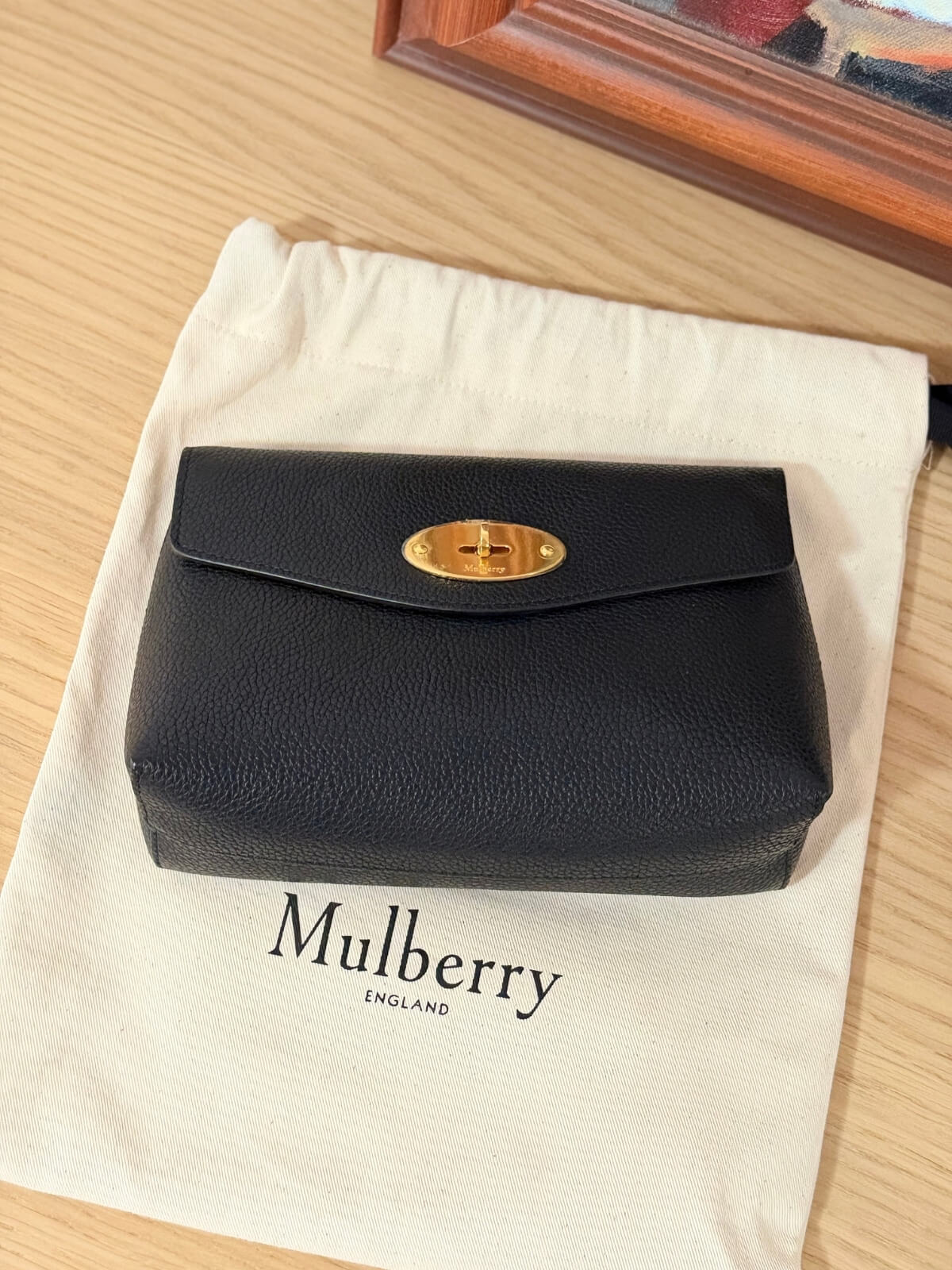 Louise Row featuring Mulberry Cosmetic Bag in black on table