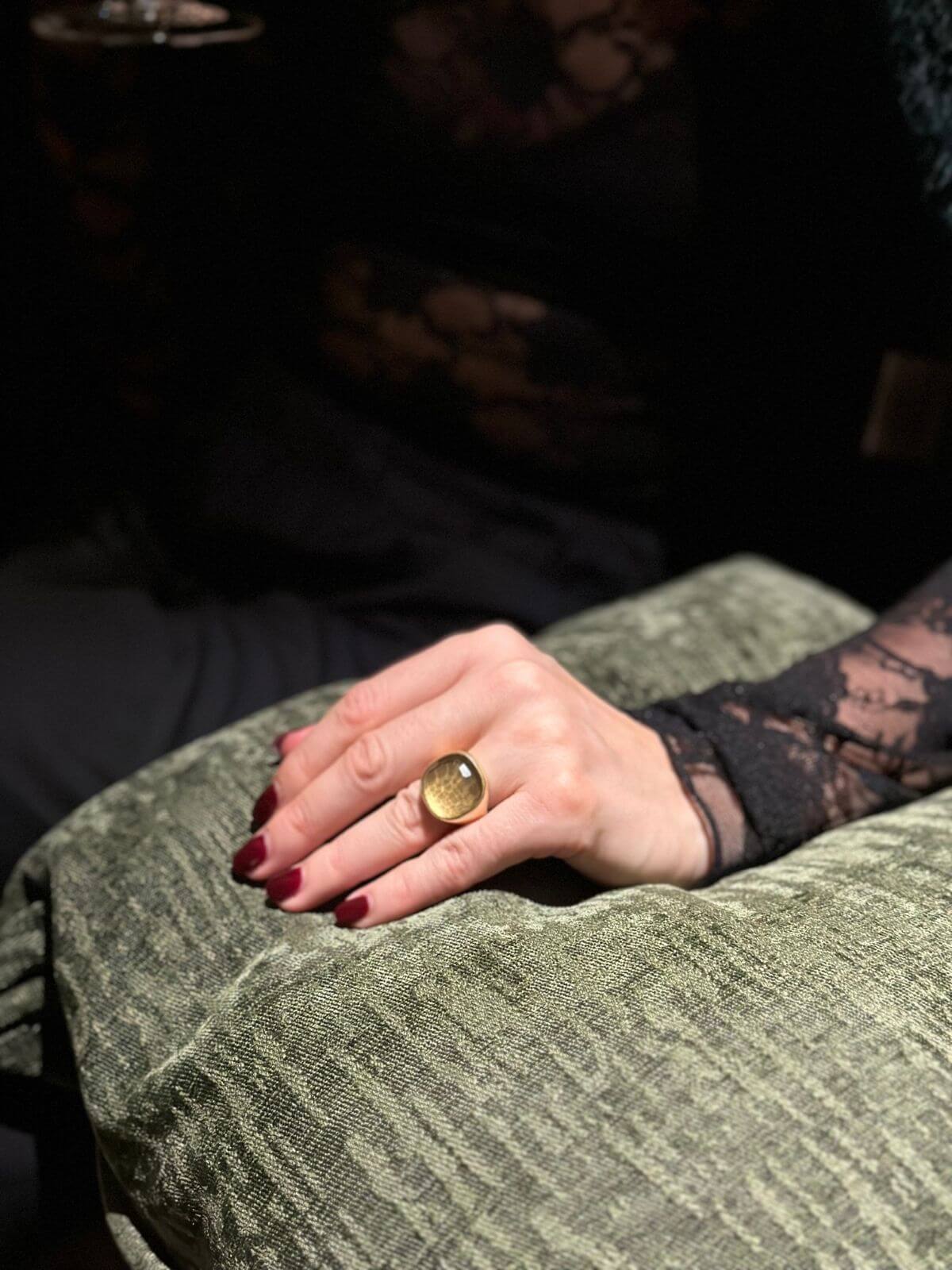 Hand with a ring - Pomelatto ring with faceted surface