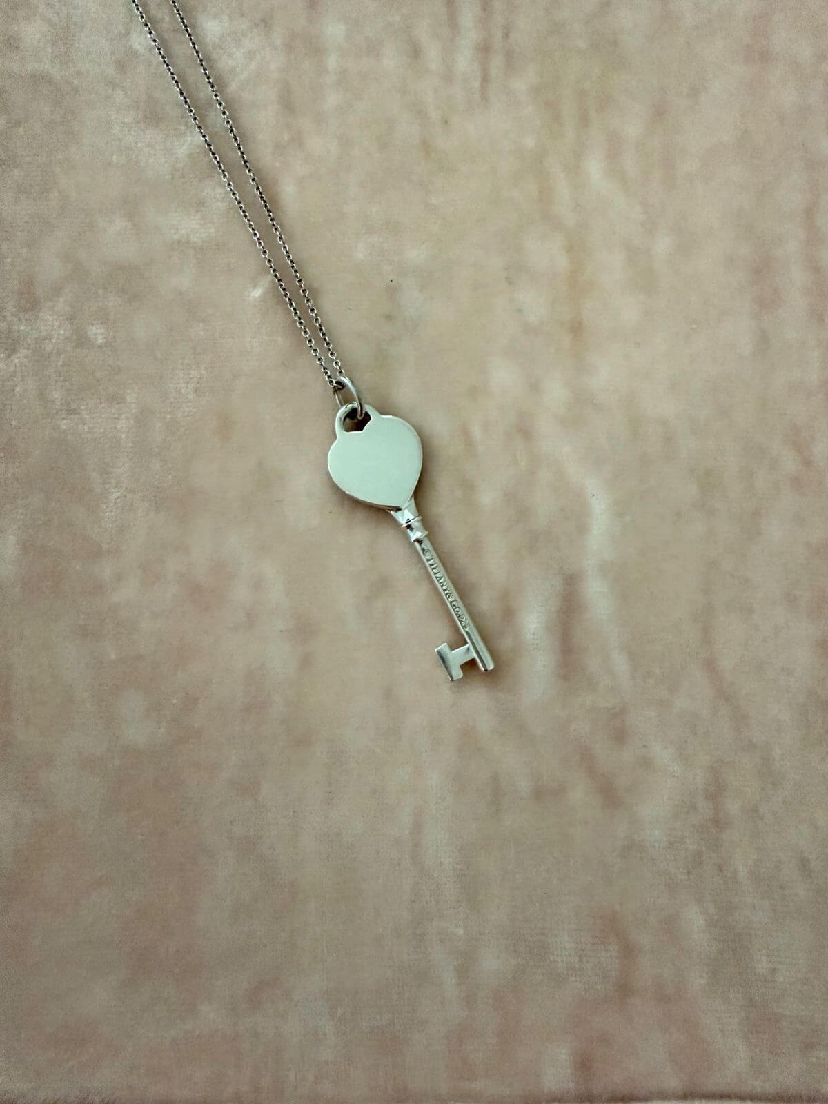 Louise Row featuring Tiffany & Co Heart Key Pendant in silver