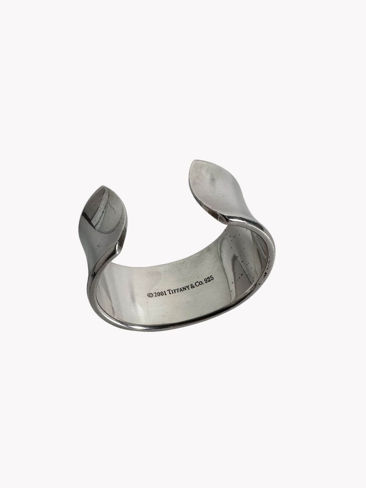 Louise Row Studio featuring Tiffany & Co 1837 Cuff silver on white background