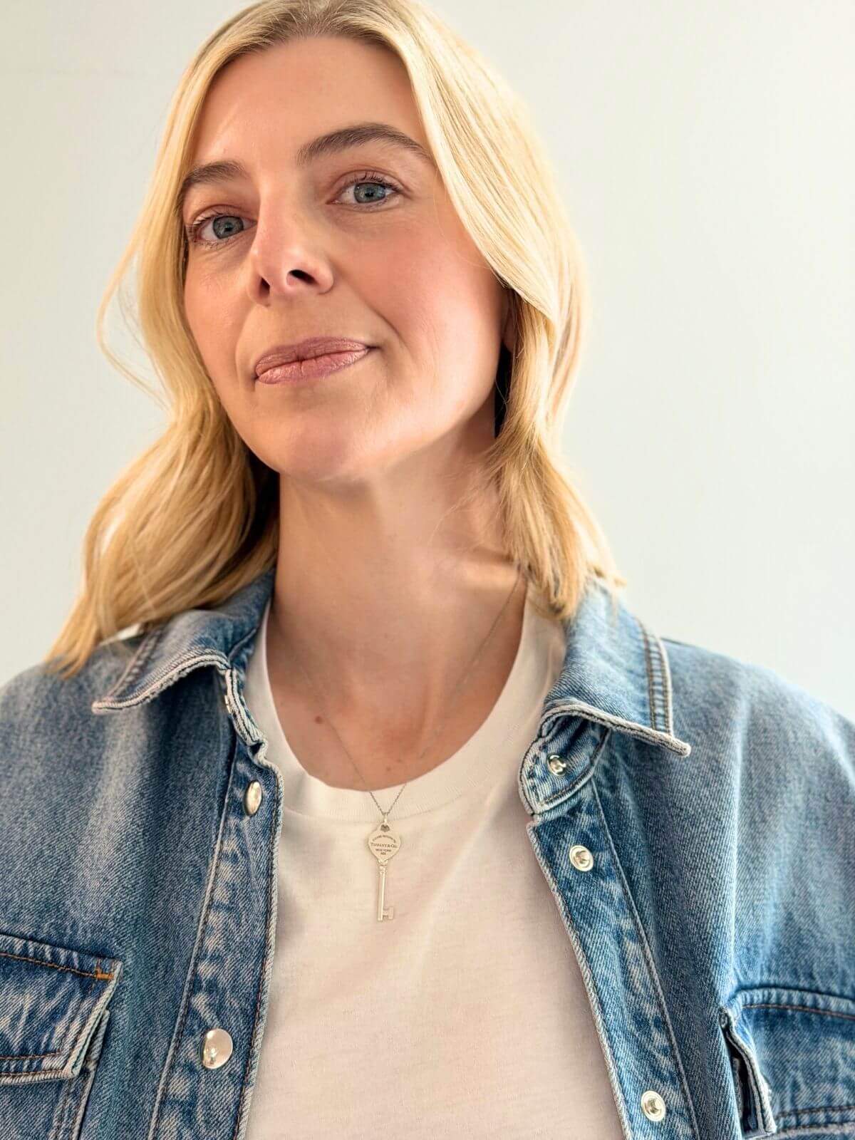 Louise Row featuring model in Tiffany Heart Key necklace