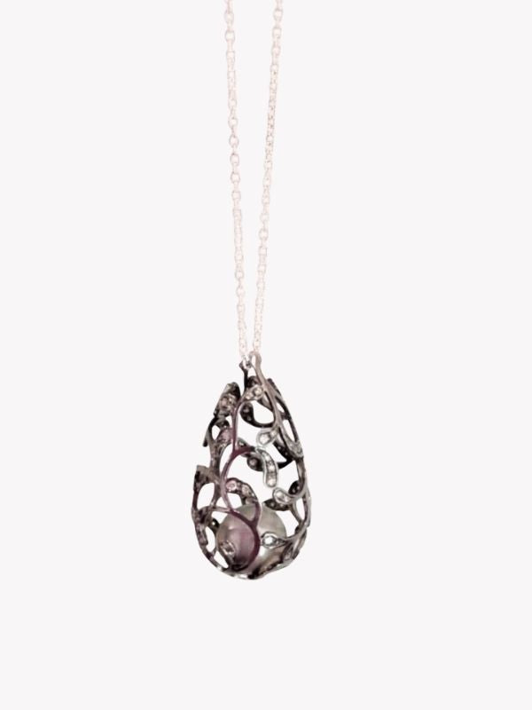Louise Row Studio featuring Utopia Bolero pearl and diamond necklace with white background.