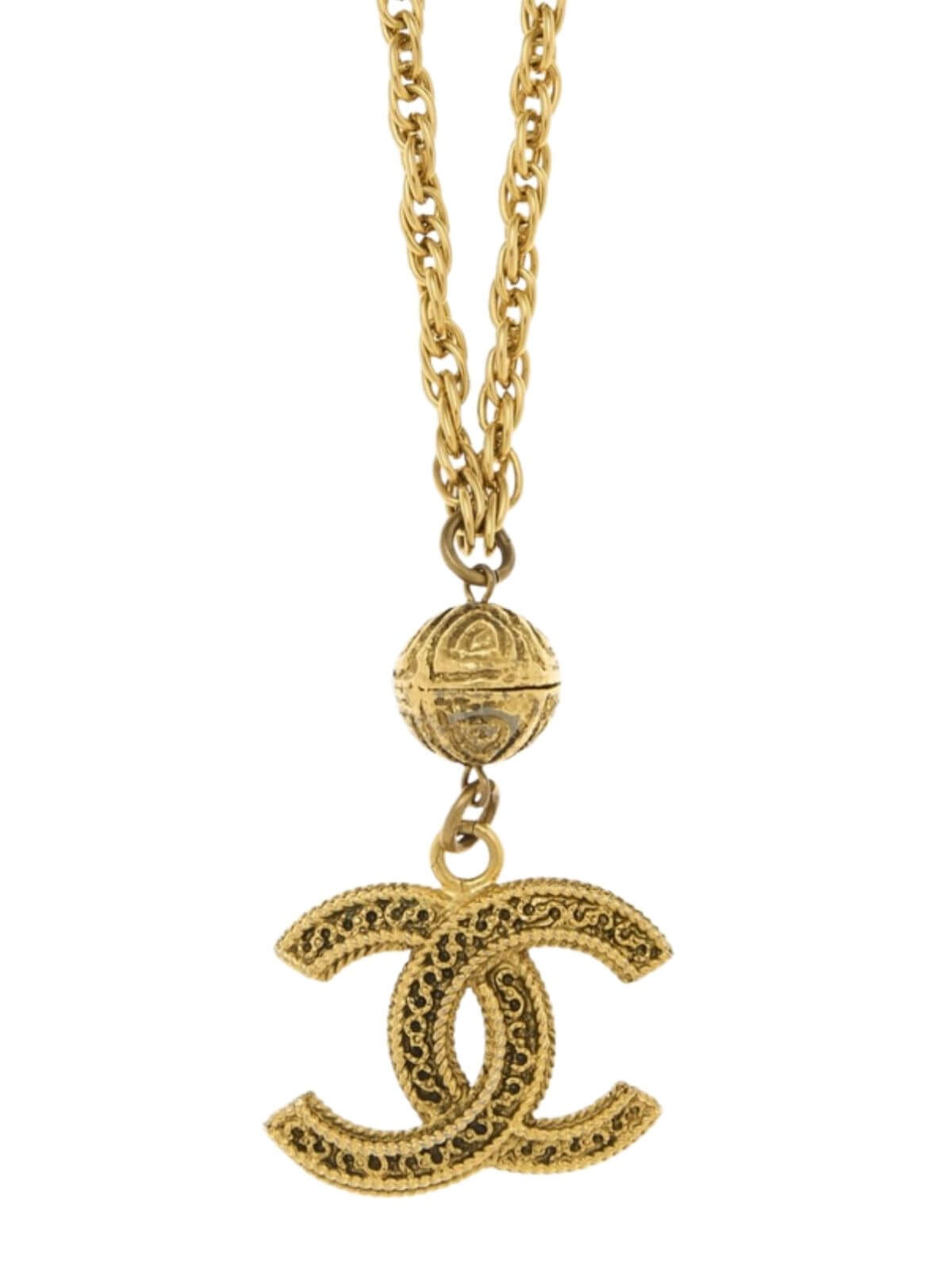 Gold necklace with a CC pendant on a white background