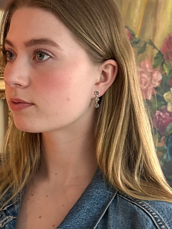 Louise Row Studio earrings, model wearing 3 drop 18K labra
