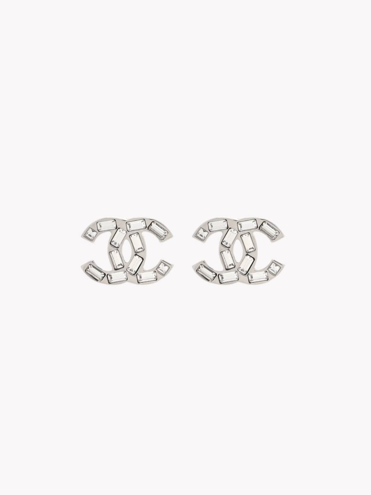 Louise Row Studio crystal Chanel earrings with a CC design on a white background