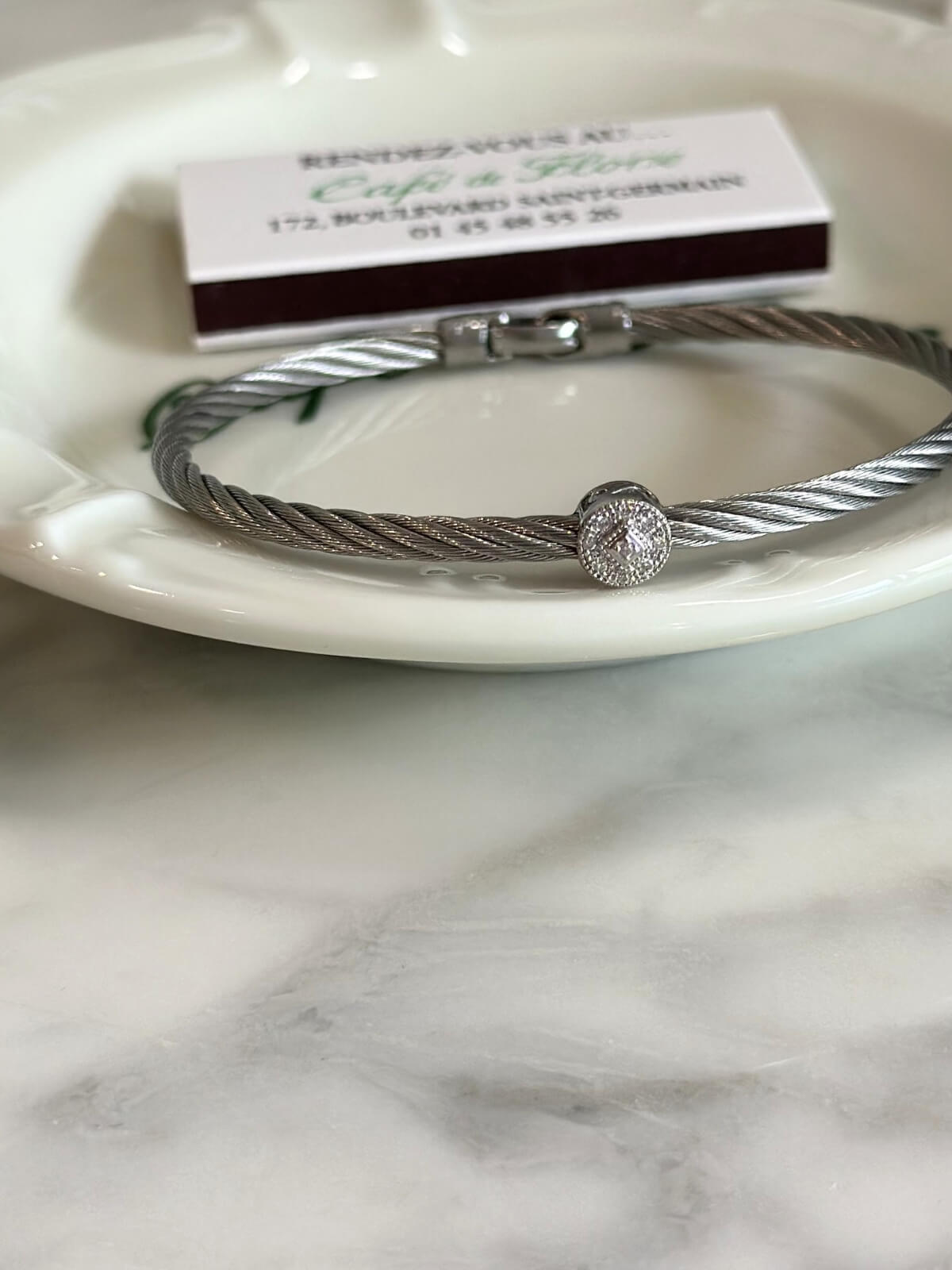 Louise Row Studio featuring Charriol Silver Bracelet with diamond station on plate
