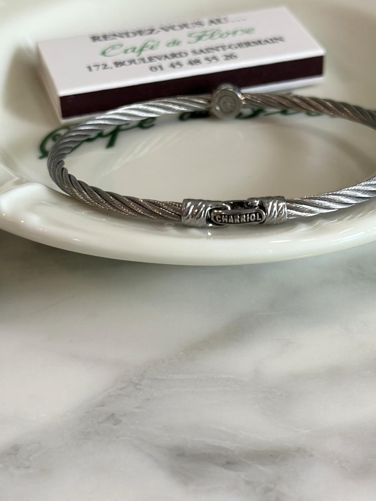 Louise Row Studio featuring Charriol Silver Bracelet with diamond station on plate back view