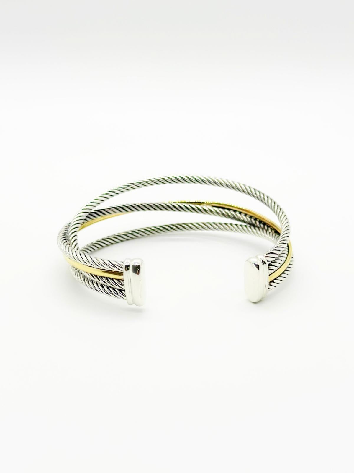 David Yurman Crossover cuff in gold and silver on white background
