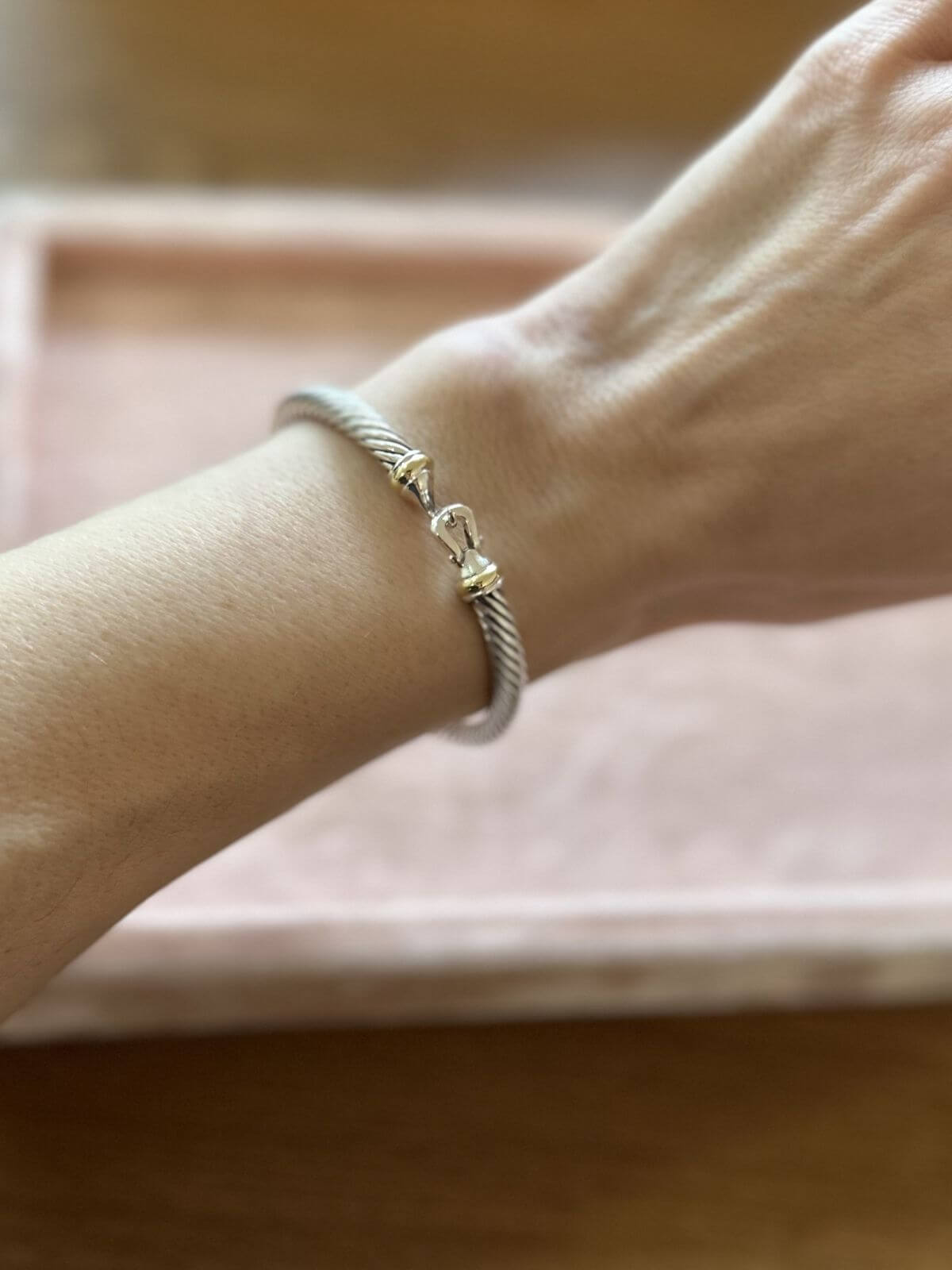 David Yurman buckle bracelet on wrist