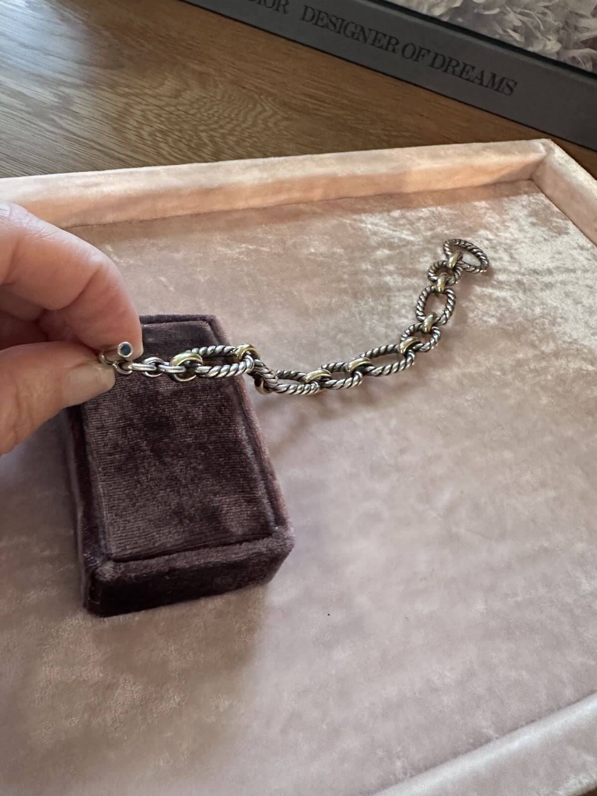 David Yurman gold and silver toggle bracelet showing sapphire on toggle