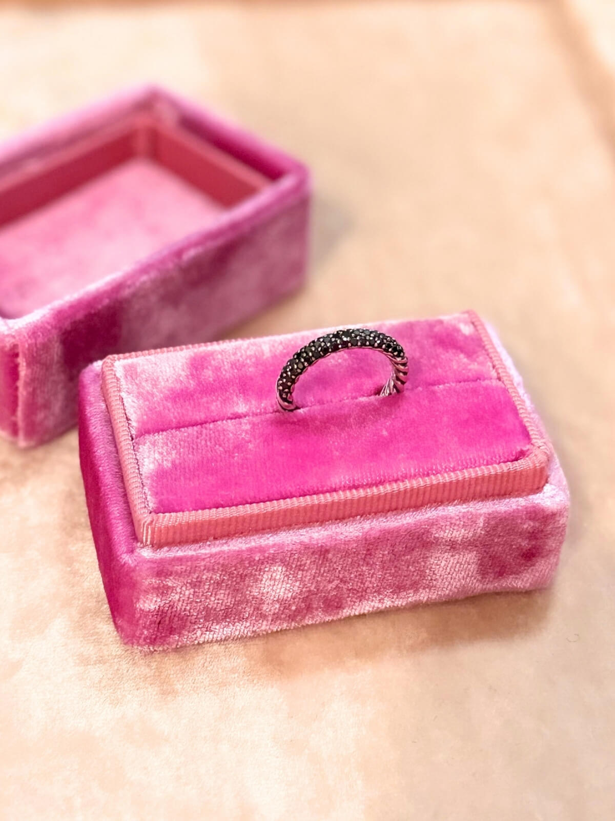 Louise Row featuring David Yurman Petite Pave black diamond ring on pink fixture
