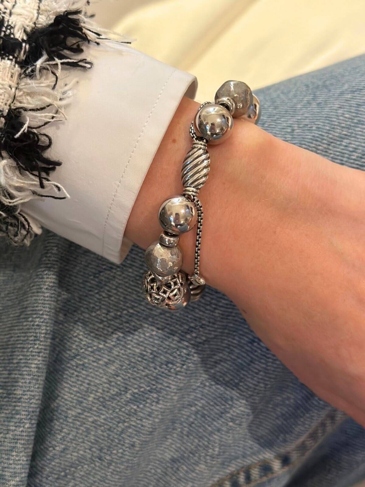 David Yurman silver bead bracelet on model.
