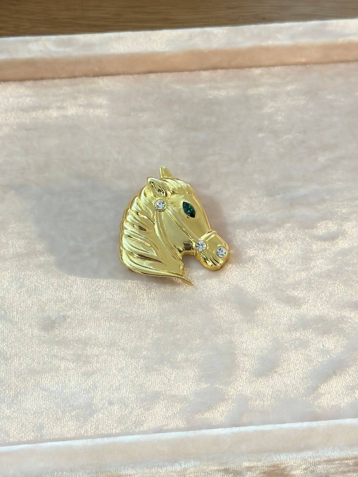 Louise Row Studio  Vintage gold Horse Brooch on pink display tray