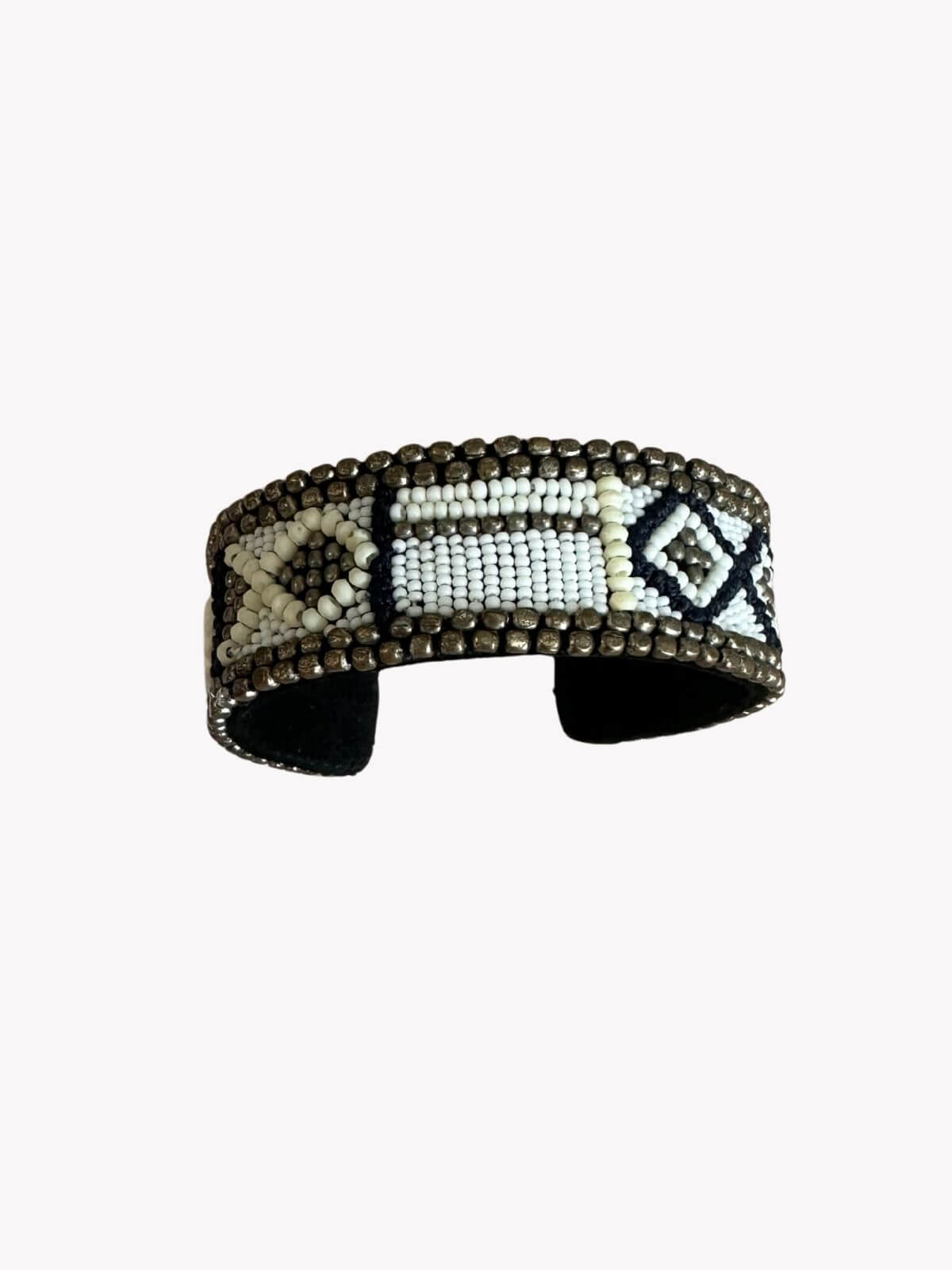 Louise Row Studio featuring Isabel Marant beaded cuff on white background. 