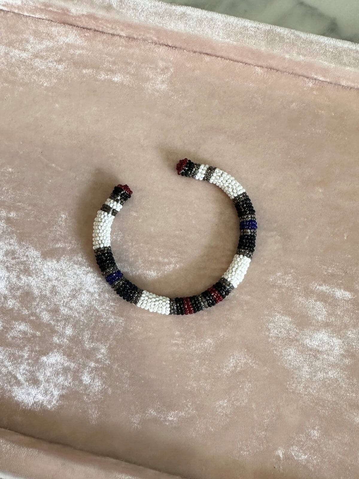Louise Row Studio featuring Isabel Marant beaded cuff on tray.