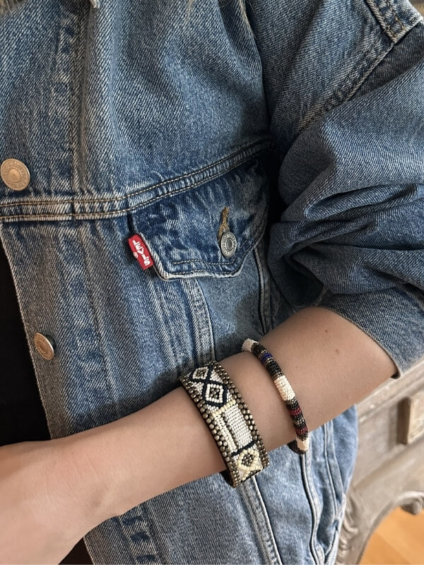 Louise row Studio featuring Isabel Marant bracelet on models arm. 